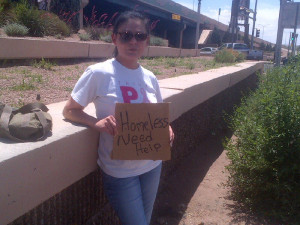 Kathy Sotelo "panhandling" on Rio Grande and I40 in mid 2013